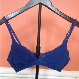 Skims triangle bralette.